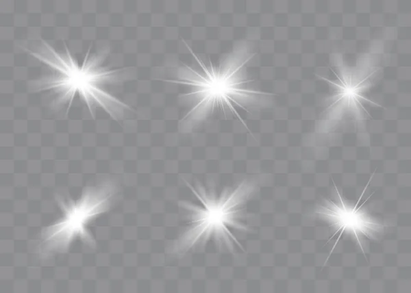 White glowing light explodes on a transparent background. Sparkling magical dust particles. Bright Star. Transparent shining sun, bright flash. Vector sparkles.