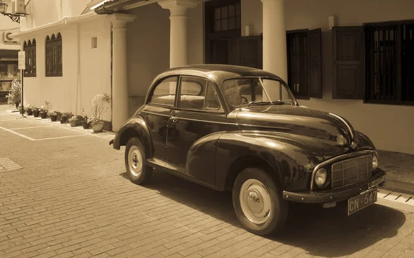 Retro the car on the street of a fort of Galle