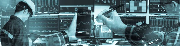 Double exposure of hand, business man & woman holding tablet with Stock market quotes and chart in monitor computer room with business office equipments .business and money trading concept,panorama photo.