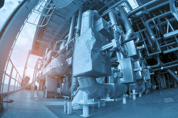 завод по переработке нефти и газа на выставке в здании современной промышленной электростанции для бизнеса концепция синего тона.