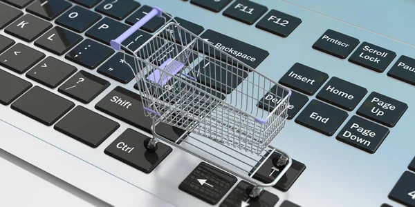 Online shopping. Shopping cart on a computer laptop keyboard. 3d illustration