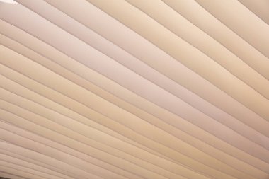 Kum tepeleri şekil ve renk, doku arka plan. Bej Tekstil çatı güneş koruma, dalgalı model için