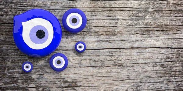 Kötü Türk göz muska, çeşitli boyutlarda, kötü şans ahşap arka plan üzerinde kopya alanı ile koruma. 3D çizim