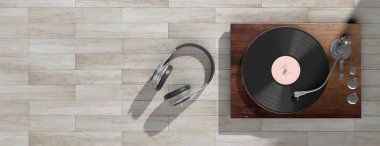 Müzik, ses. Kulaklık ve vinil Lp pikap ahşap arka plan, afiş, kopya alanı. 3D çizim