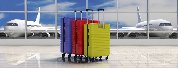 Koncepcja Podróży Lotniczych Trzy Jasne Kolory Walizki Tle Terminalu Lotniska — Zdjęcie stockowe