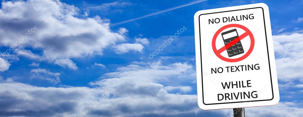 No dialing, no texting while driving. White sign on blue cloudy sky background, space for text, banner. 3d illustration