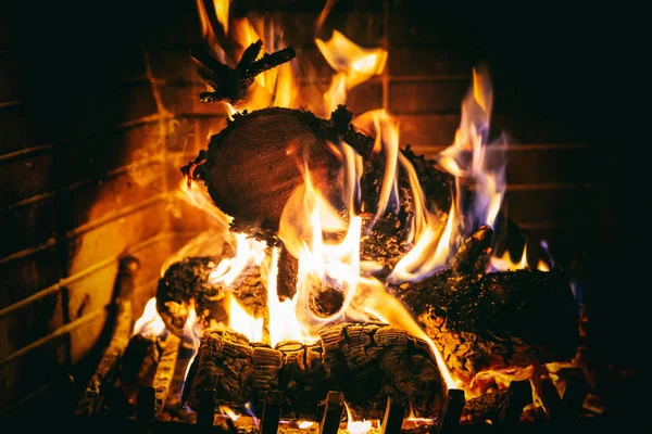 Christmas Time Cozy Fireplace Wood Logs Burning Red Firebricks Background — Stock Photo, Image