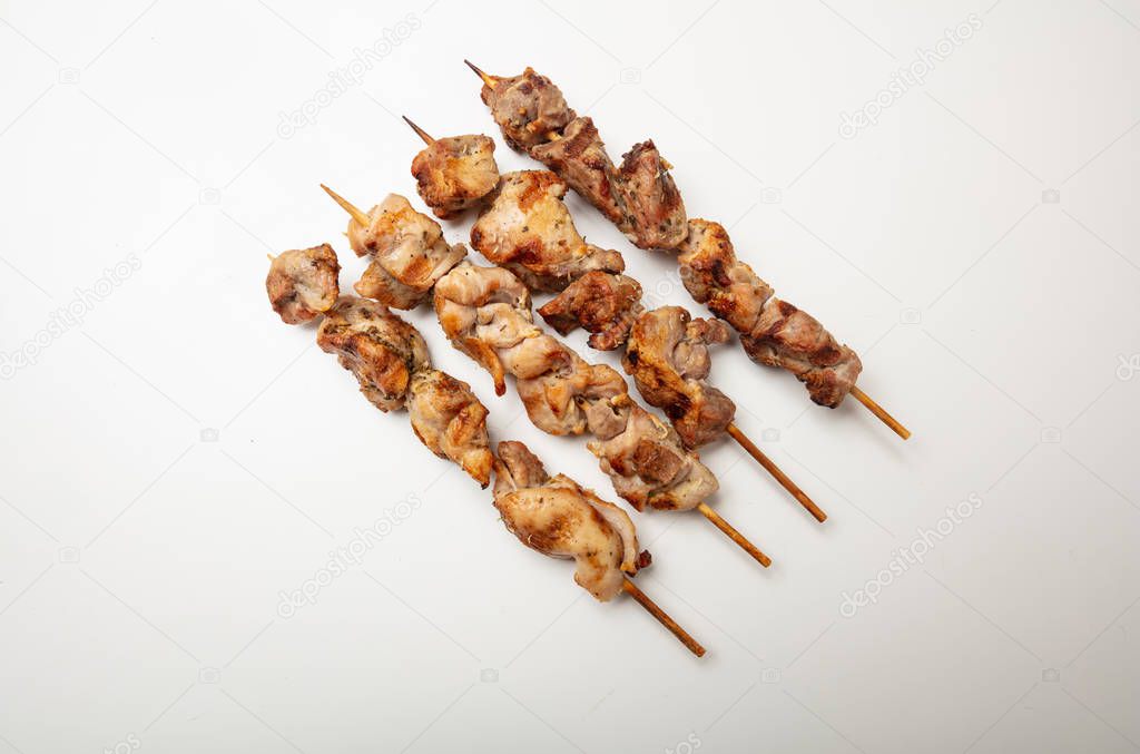 Souvlaki traditional greek meat food, isolated on white background, top view