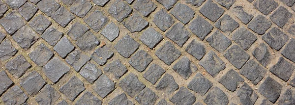 Stein gepflasterte Straße, Textur Hintergrund, Draufsicht, Banner — Stockfoto