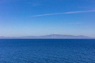 Yunanistan. Ege Denizi. Su doku arka plan mavi gökyüzü ve sakin deniz