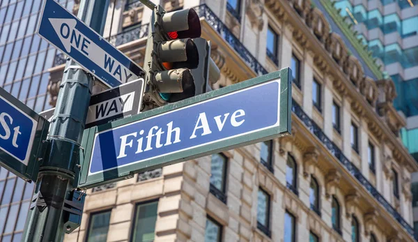 5th ave, Manhattan New York downtown. Blue color street signs,