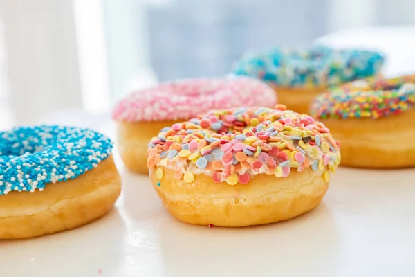 Doughnuts assorted on white. Close up view — Stock Photo, Image