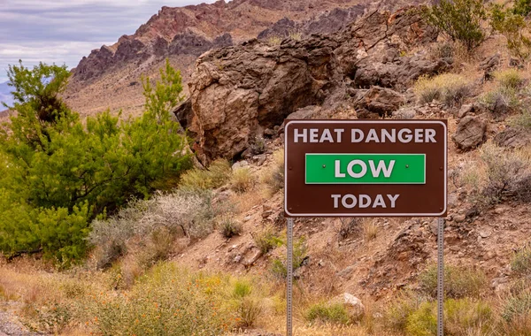 Valley of fire state park, Nevada USA. Information sign text Heat danger low today, — Stock Photo, Image