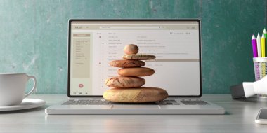 Zen taşları bir bilgisayar dizüstü ofis masası arka plan yığını. 3d illüstrasyon