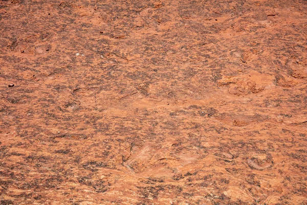 Red sandstone desert rock background, texture. Stock Picture