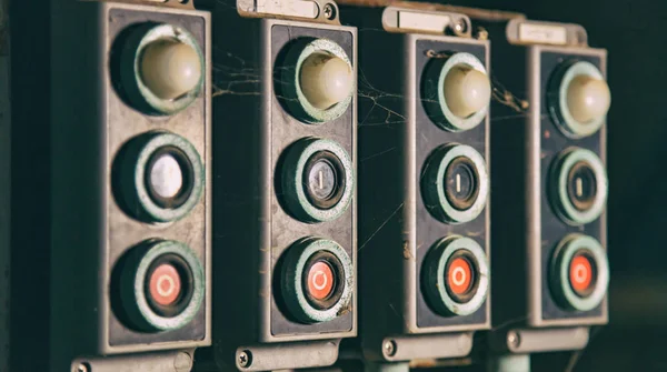 Industrial control panel old. Start, stop concept. Push buttons, switches retro background