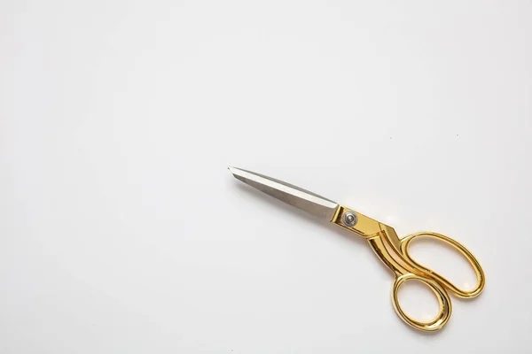 Scissors gold and silver isolated against white background — Stock Photo, Image