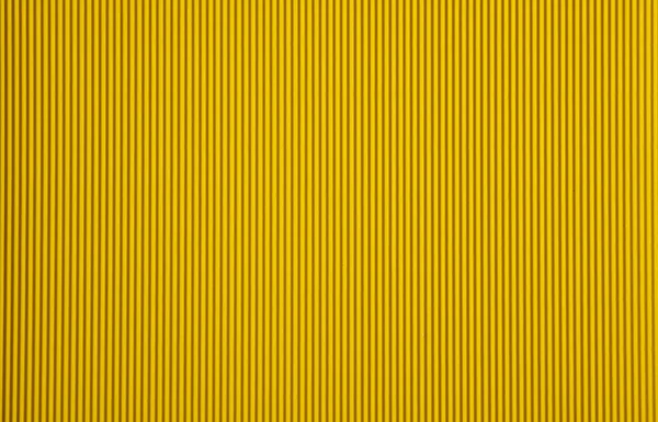 Textura y fondo de cartón ondulado de color amarillo — Foto de Stock