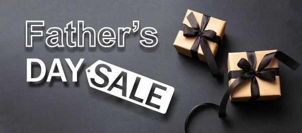 Fathers day SALE, Special offer sale. Promotion and shopping template for fathers day. White letters text and gift boxes on black color background, banner.