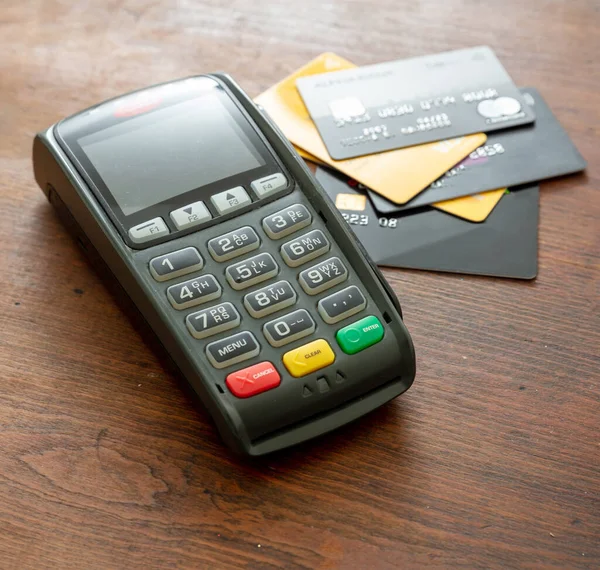 Pos Terminal Credit Cards Wooden Background Terminal Cash Register Machine — Stock Photo, Image