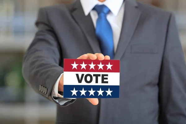 Usa Elections Man Holding Card Vote Text Message American Flag — Stock Photo, Image