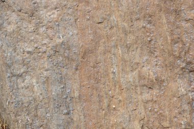 Doğal taş arka plan dokusu, gri kahverengi renk, Kea Adası, Yunanistan, üst manzara.