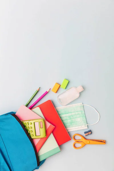 School office supplies background. Back to school. Pastel color stationery  flat lay, top view. Stock Photo by rawf8