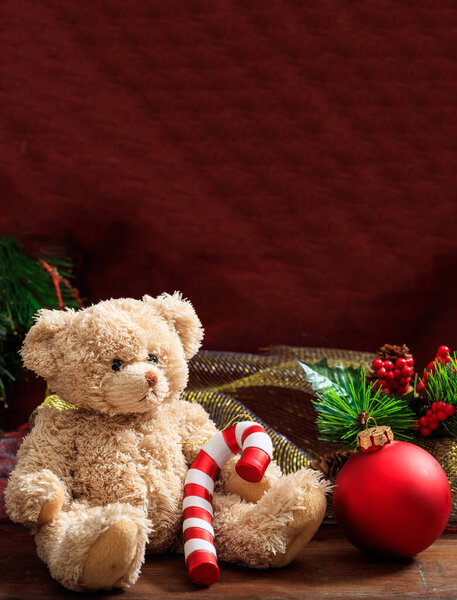 Christmas decoration, festive teddy bear and xmas ornaments, Children holiday toys and gifts. Greeting card template, copy space