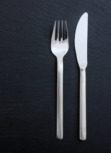 Mesa Almuerzo Negocios Tenedor Cuchillo Aislados Sobre Fondo Negro Vista —  Fotos de Stock