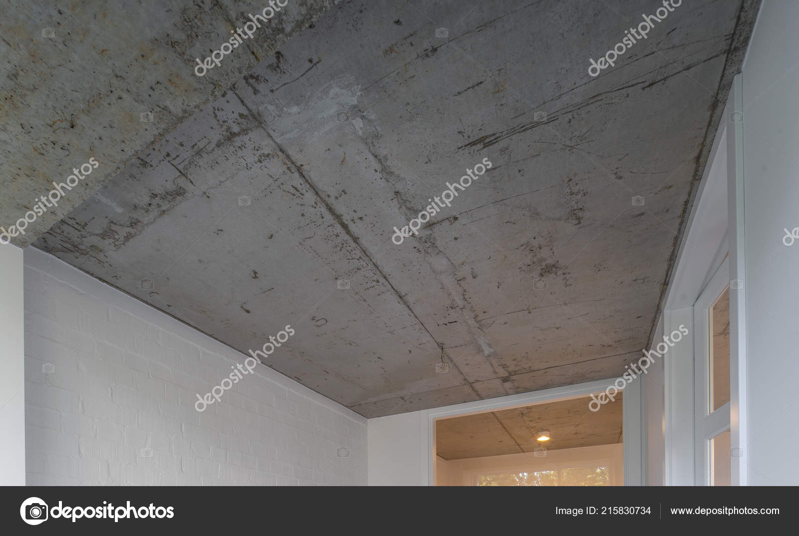 Concrete Ceiling And Lighting In A Modern Apartment Concrete