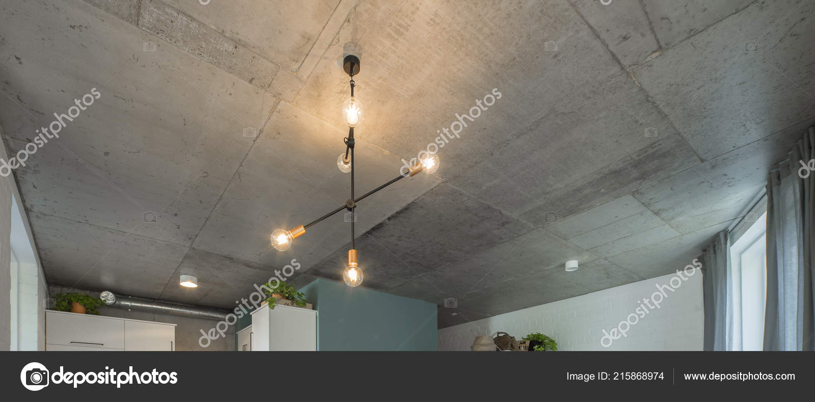 Concrete Ceiling And Lighting In A Modern Apartment