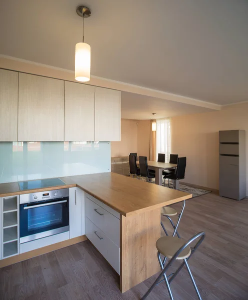 Modern home interior. Fitted kitchen in the house. The interior of the room.