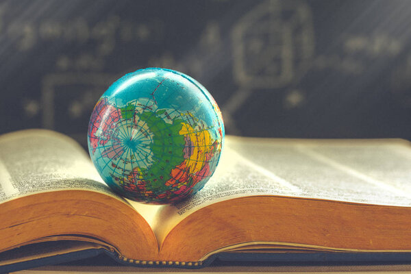 World globe on  book. education school Concept