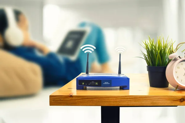 Closeup Wireless Router Man Using Smartphone Living Room Home Ofiice — Stock Photo, Image
