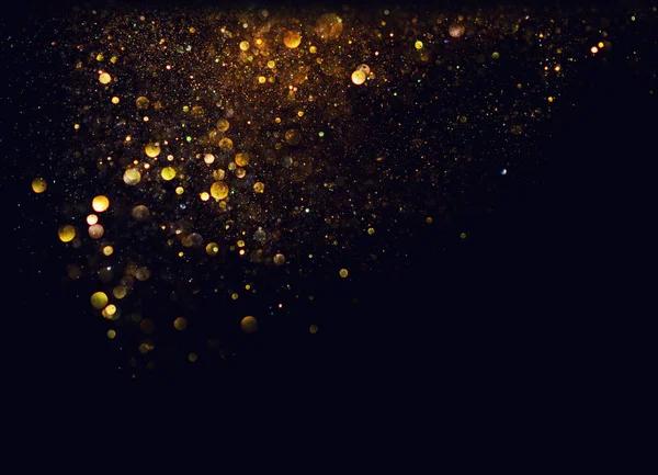 Glitter vintage luci di sfondo. oro e nero. de focalizzata — Foto Stock