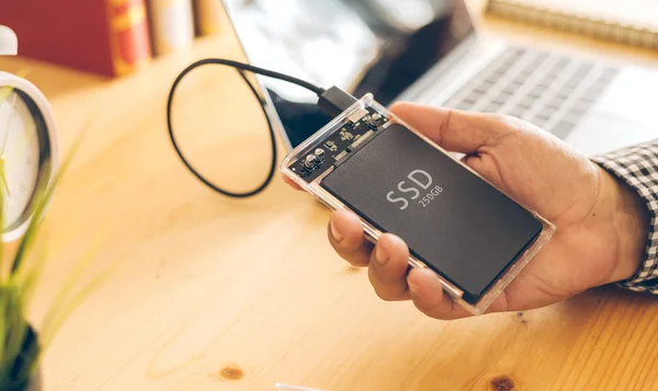 SSD and Laptop,solid state drive with sata 6 gb connection — Stock Photo, Image