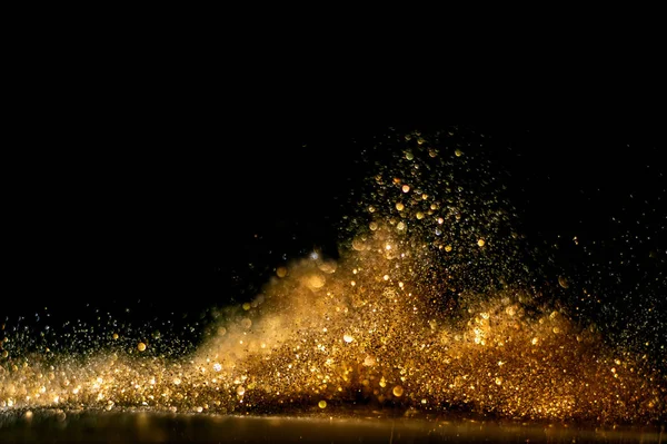 キラキラヴィンテージライトの背景。金と黒だ。デ・フォーカス — ストック写真