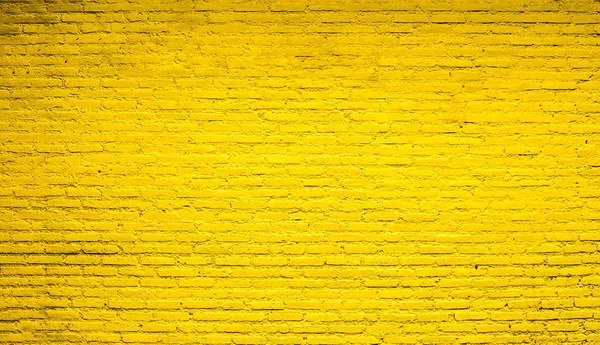 Vieux mur de briques jaune. Texture carrelable sans couture — Photo