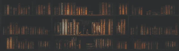 Panorama blurred bookshelf Many old books in a book shop or libr — Stock Photo, Image