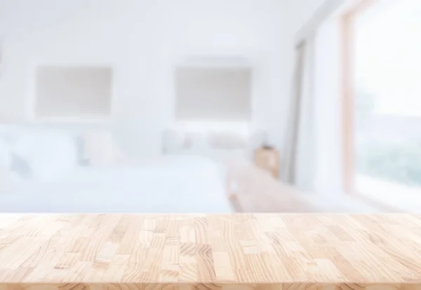 Holztischplatte Vor Verschwommenem Schlafzimmerinterieur Zur Montage Oder Anzeige Ihrer Produkte — Stockfoto