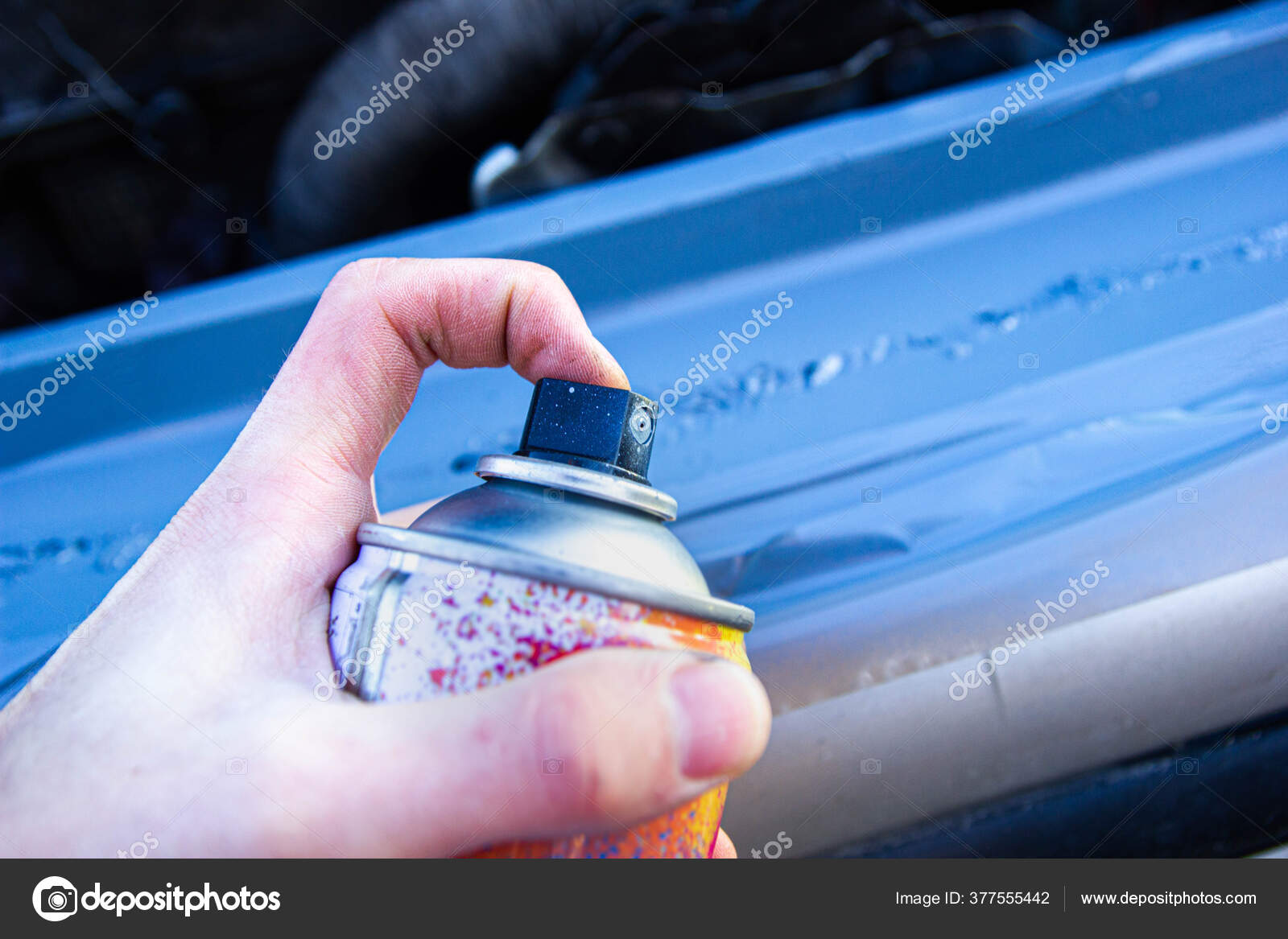 Male Hand Holding Spray Paint Can Painting Car Stock Photo by  ©velimirisaevich 377555442