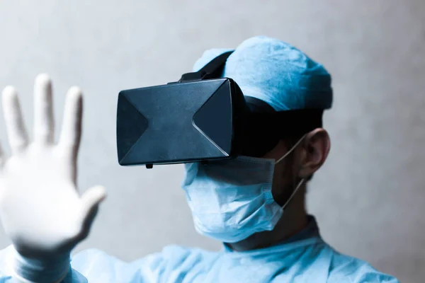 Scientist doctor with augmented reality glasses 3D VR