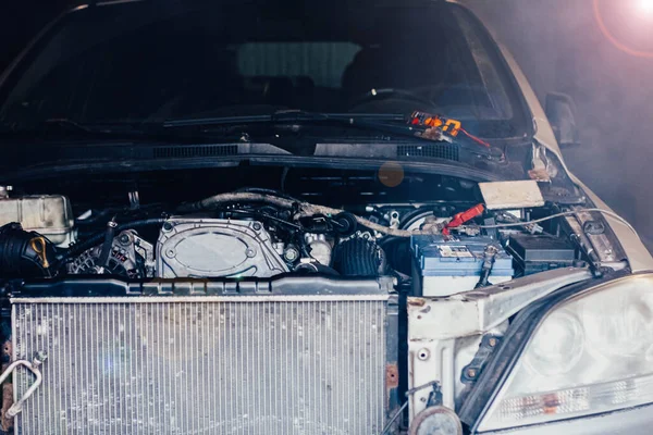 Repair of an internal combustion engine of a car. Details of the motor.