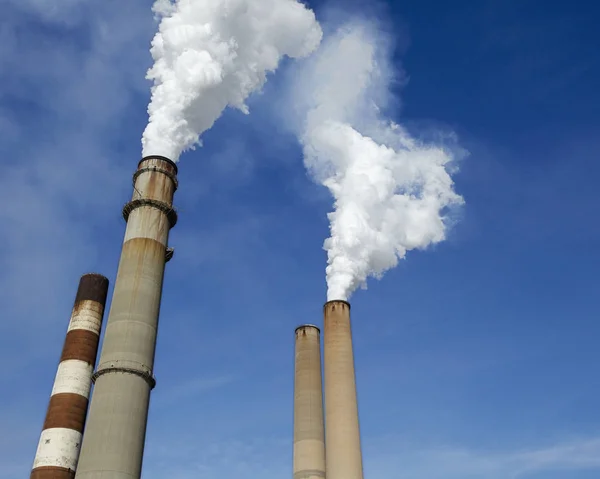 Low Angle View Smokestacks Billowing Smoke Blue Sky — Stock Photo, Image