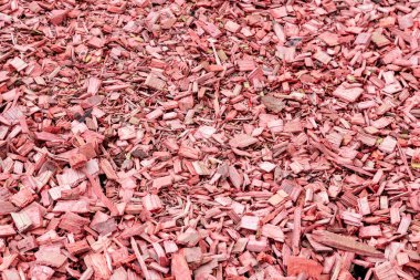 Kırmızı ahşap kesimler ile arka plan. Peyzaj tasarımı için dekoratif malzeme