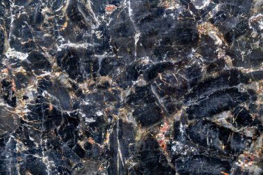 Doku doğal cilalı koyu taş. Arka plan