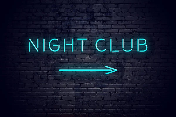 Brick wall with neon arrow and sign night club