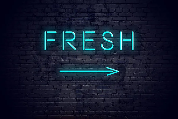 Brick wall with neon arrow and sign fresh