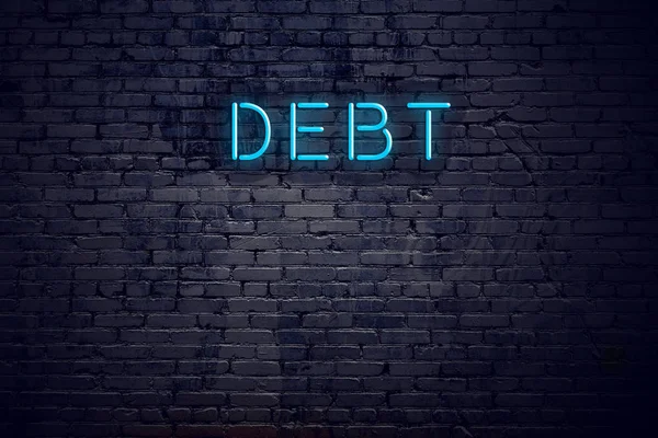 Tuğla duvar ve neon işareti metin borç ile
