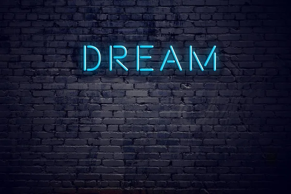 Baksteen muur en neon teken met tekst droom — Stockfoto